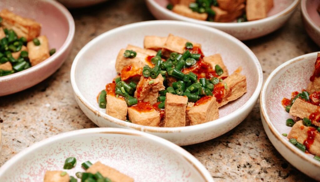 full meal of tofu presented to guests